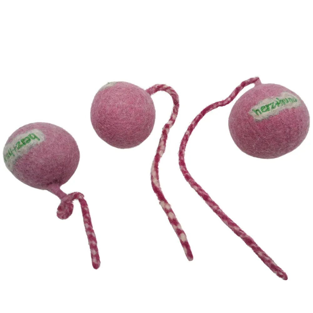 Schleuderball pink mit Wurfleine für Hunde aus Bio-Wollfilz