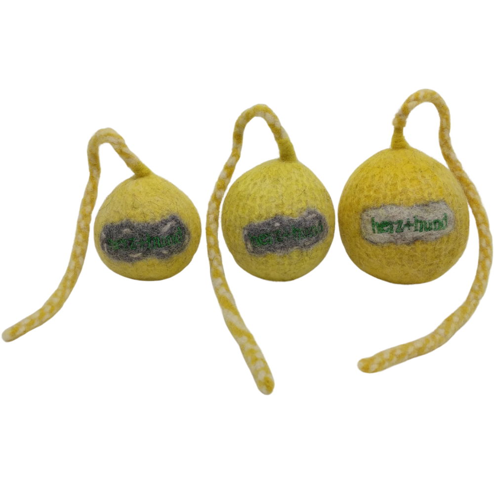 Schleuderball gelb mit Wurfleine Schleuderball gelb mit Wurfleine für Hunde aus Bio-Wollfilz