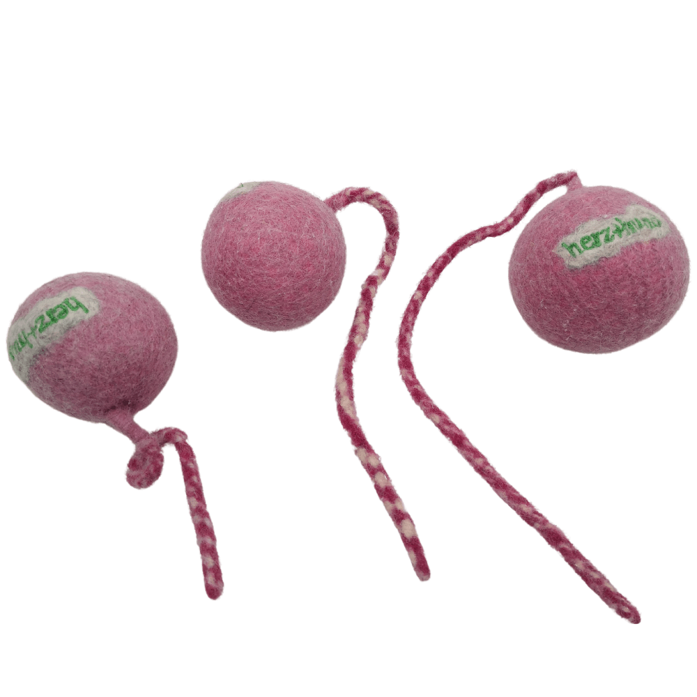 Schleuderball pink mit Wurfleine Schleuderball pink mit Wurfleine für Hunde aus Bio-Wollfilz